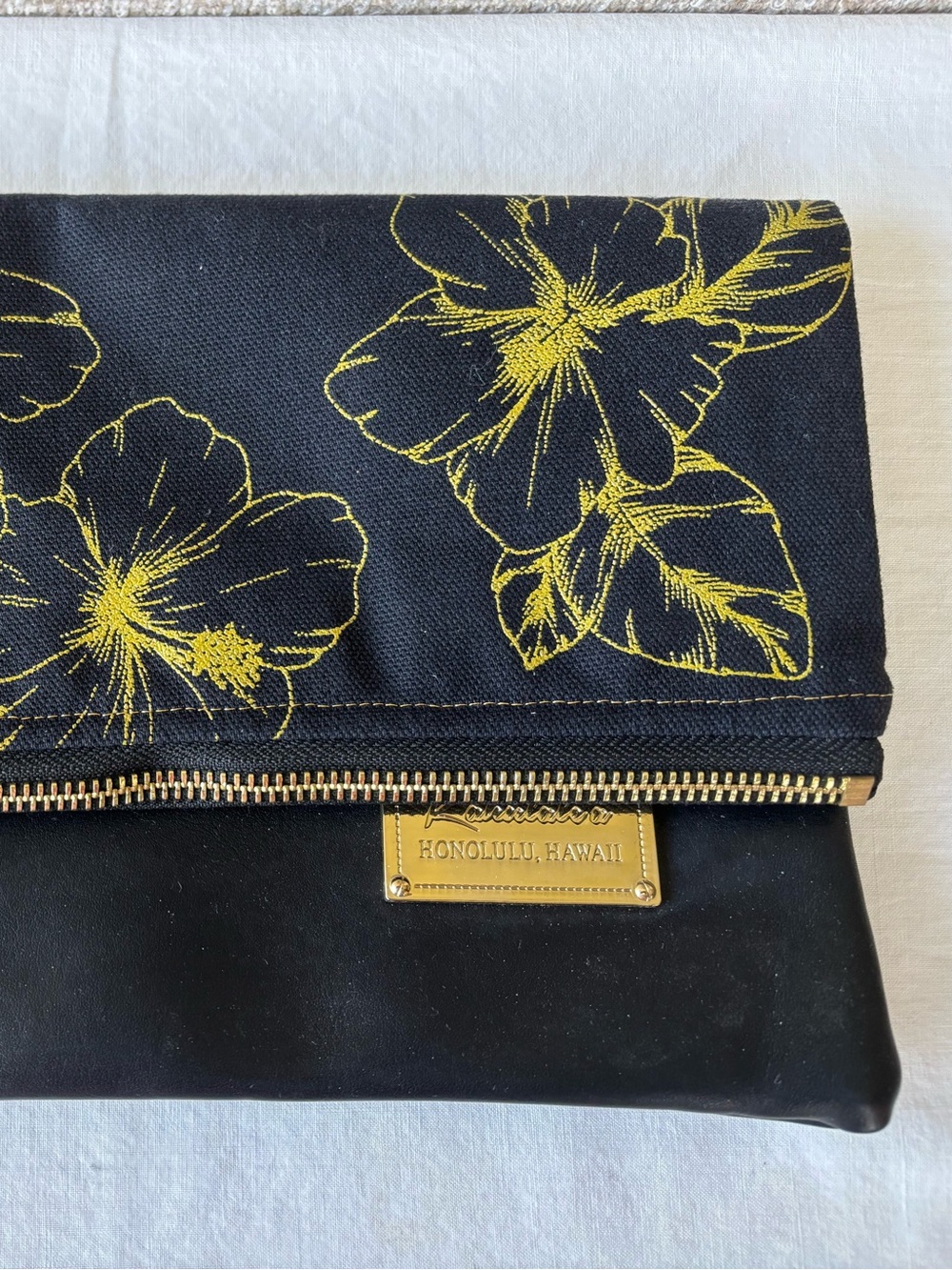 Fold-Over Clutch Bag in Black and Gold